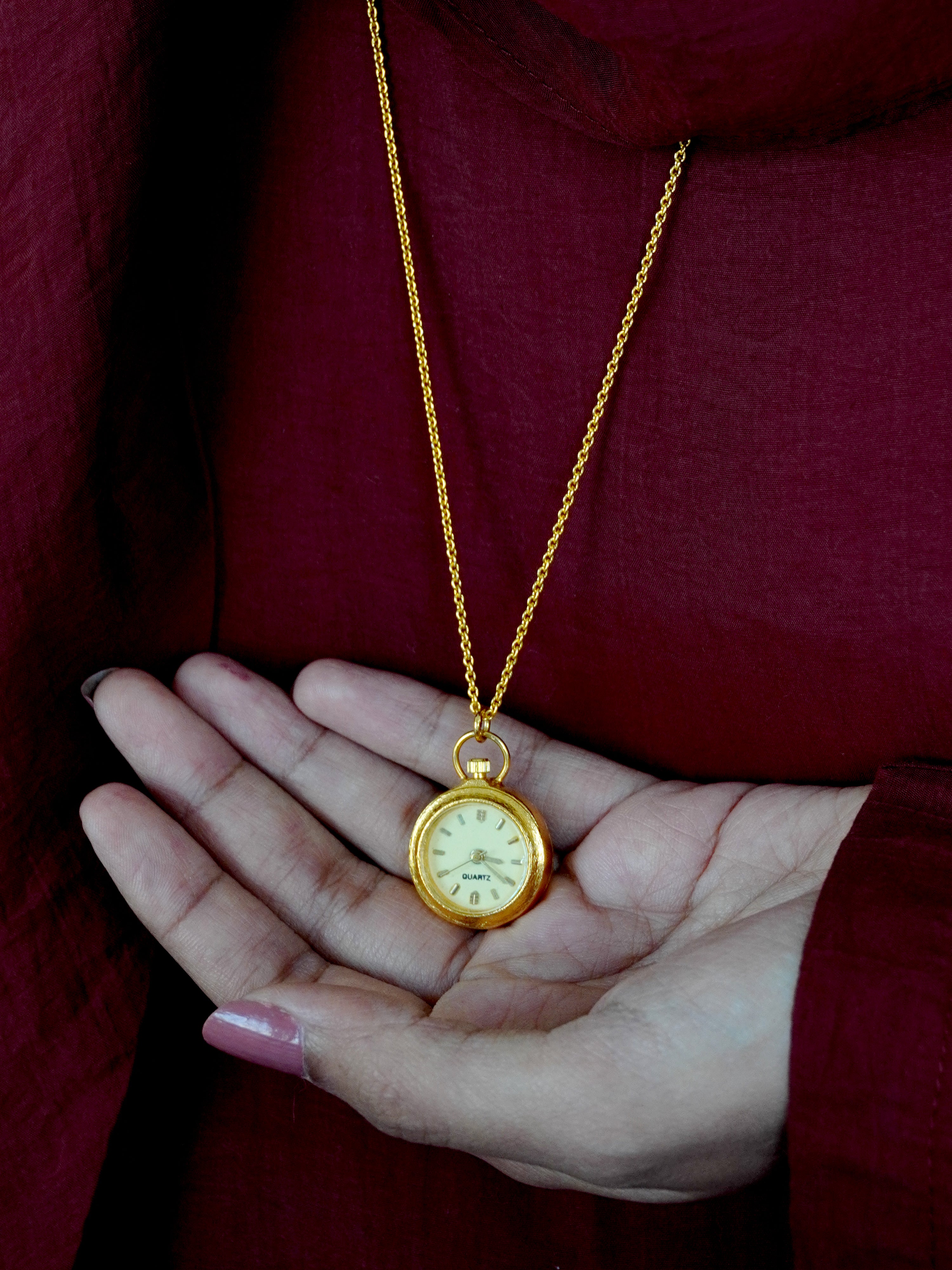 El colgante del reloj